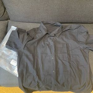 Men’s black button down shirt brand new- runs small